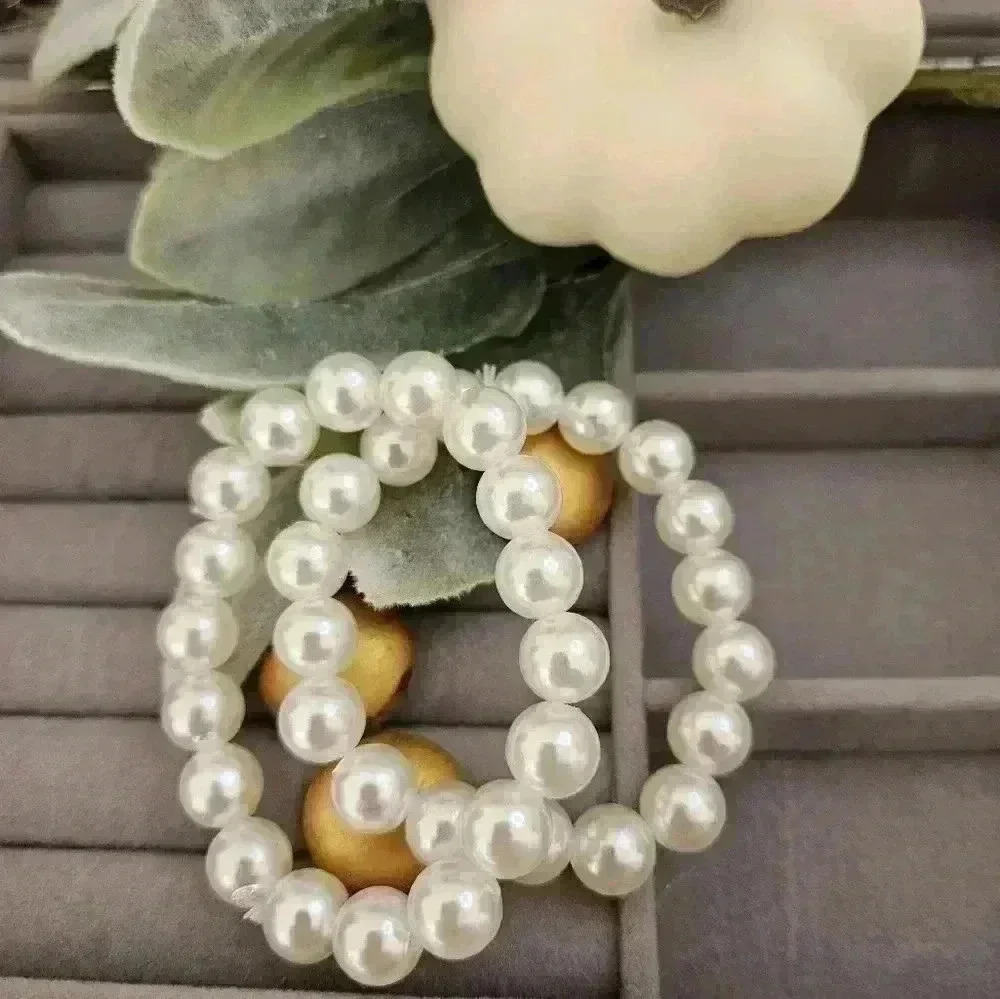 2 pcs shell pearl hair decoration or bracelet. Stretch 2.95 in.